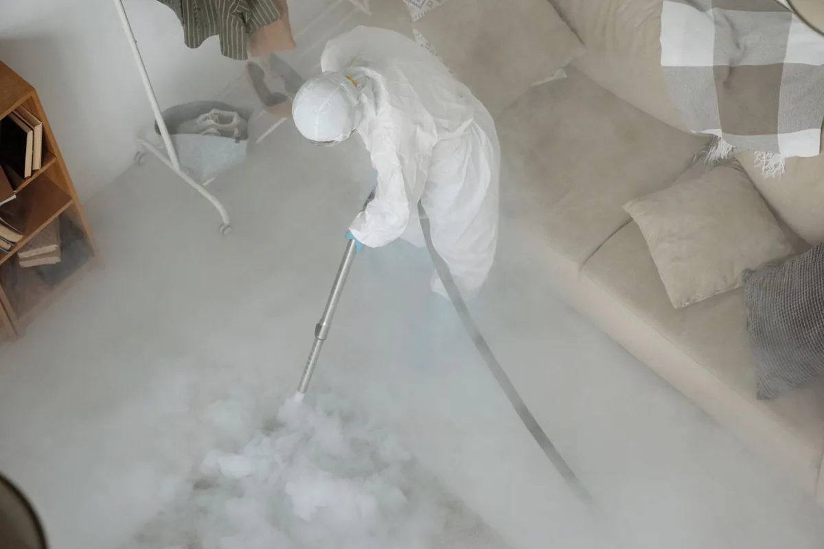 Biohazard cleanup technician in protective equipment, Brusly, LA